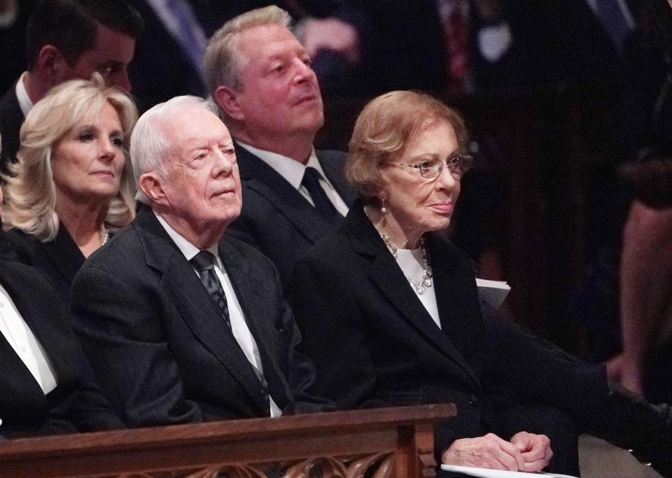 Former US president Jimmy Carter and his wife Rosalynn Carter and (back row) Jill Biden, wife of former vice president Joe Biden, and former vice president Al Gore attend a funeral service for former US president George H. W. Bush at the National Cathedral in Washington, DC on December 5, 2018.