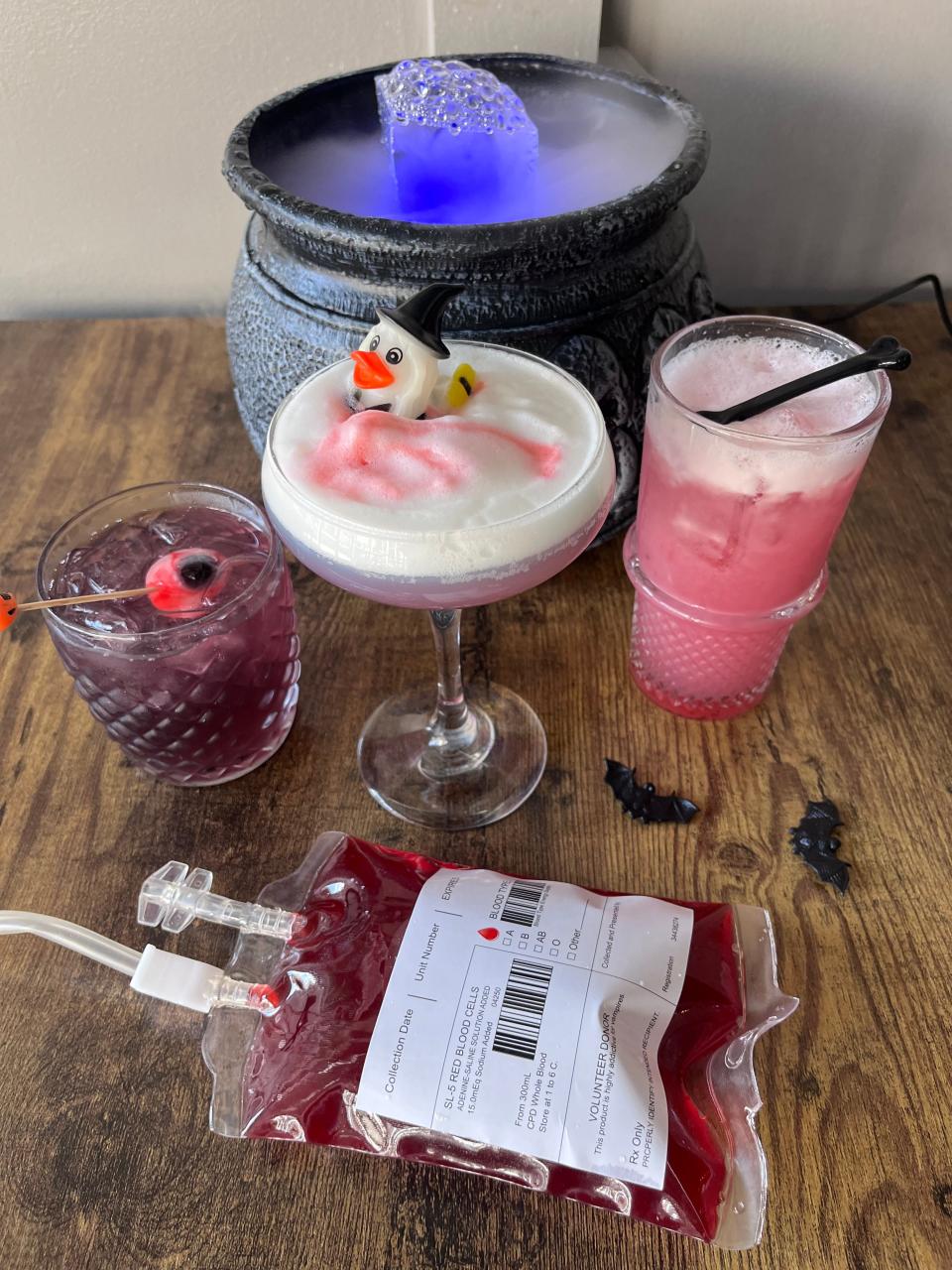 Hops and Hardware Distillery in Bristol Borough has several Halloween-themed cocktails on its menu, including Hocus Pocus with a gummy eyeball, left, Halloween Duck Around with a glow in the dark witch duck, center, Cemetery Sour blackberry sour, right, and Blood IV Bag.