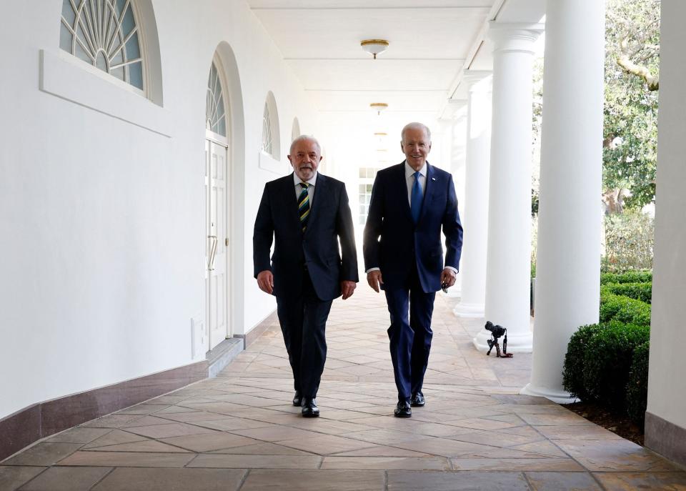 US President Joe Biden and Brazilian President Luiz Inacio Lula da Silva walk together along the Rose Garden colonnade at the White House in Washington, DC, February 10, 2023. (Photo by JONATHAN ERNST/POOL/AFP via Getty Images)