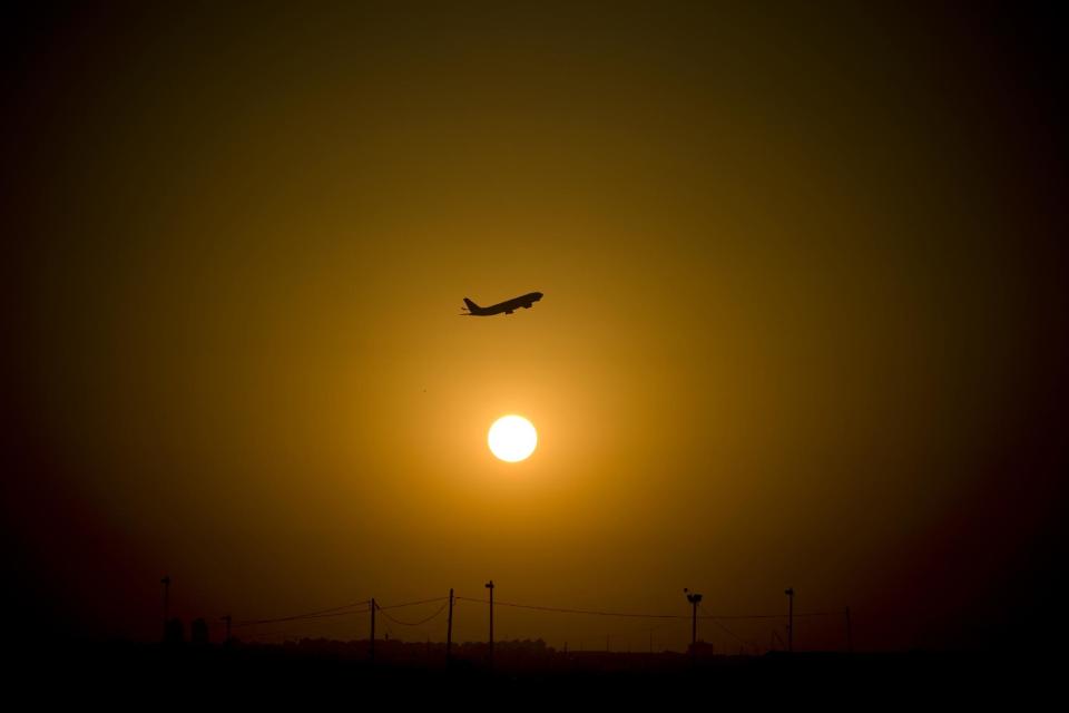 FILE - In this Nov. 2, 2010 file photo, a passenger plane takes off from Ben Gurion airport near Tel Aviv, Israel. Israel's defense ministry says it successfully completed final testing on a system that protects commercial planes from missile attacks. Eitan Eshel, head of research and development at the ministry, said Wednesday, Feb. 26, 2014, that testing of the "Sky Shield" system was "100 per cent successful." The system integrates laser technology with a thermal camera to protect aircraft against missiles fired from the ground. It deflects missiles fired at aircraft by changing their direction. Eshel did not say when the system, under development for about a decade, would become operational. Islamic militants fired two surface-to-air missiles at an Israeli charter plane shortly after takeoff in Mombasa, Kenya, in 2002. The missiles missed their target but spurred an Israeli effort to improve countermeasures. (AP Photo/Ariel Schalit, File)