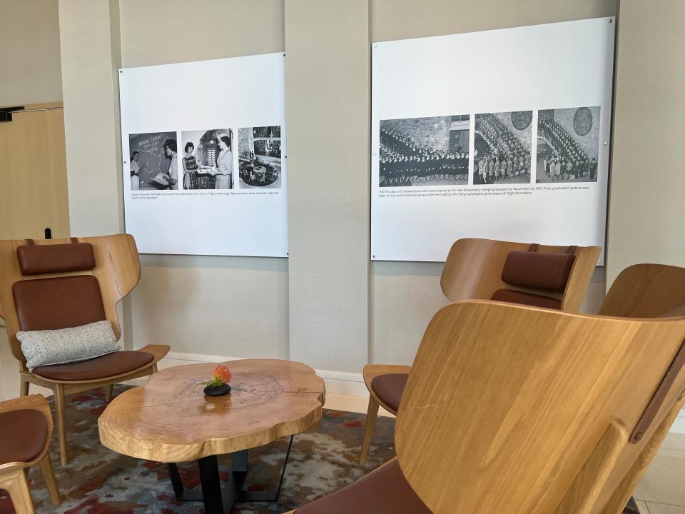 Black and white photos on the wall at Skyview 6 show the Stewardess College graduates on the staircase, alongside photos of them also studying.