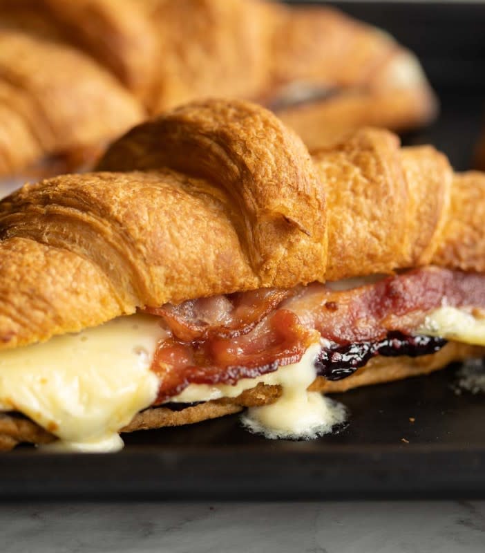 <p>These croissants are filled with brie, a quick homemade blackberry jam and crispy bacon. Stuffed croissants don’t come more delicious than this!</p><p><strong>Get the recipe: <a href="https://www.dontgobaconmyheart.co.uk/filled-croissants/" rel="nofollow noopener" target="_blank" data-ylk="slk:Brie, Blackberry and Bacon Croissants;elm:context_link;itc:0;sec:content-canvas" class="link rapid-noclick-resp"><em>Brie, Blackberry and Bacon Croissants</em></a></strong></p>