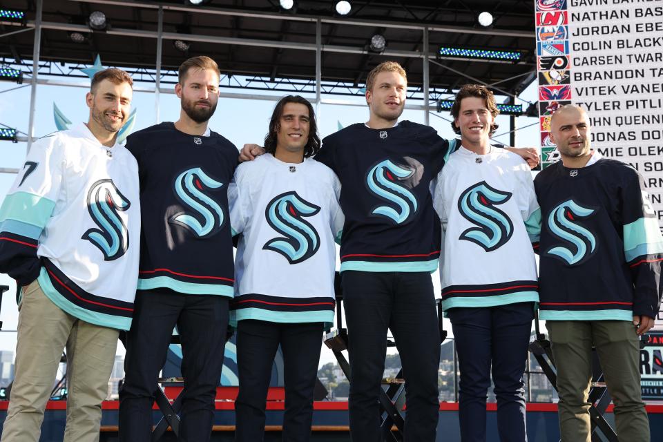 Seattle Kraken expansion draft picks Jordan Eberle, Chris Driedger, Brandon Tanev, Jamie Oleksiak, Haydn Fleury and Mark Giordano during Wednesday's expansion draft at Gas Works Park.