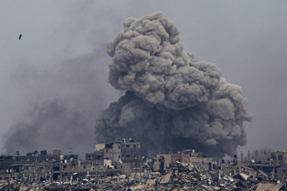 Smoke and explosions rise inside the Gaza Strip, as seen from southern Israel, Sunday, Sunday, March 17, 2024. (AP Photo/Ariel Schalit)