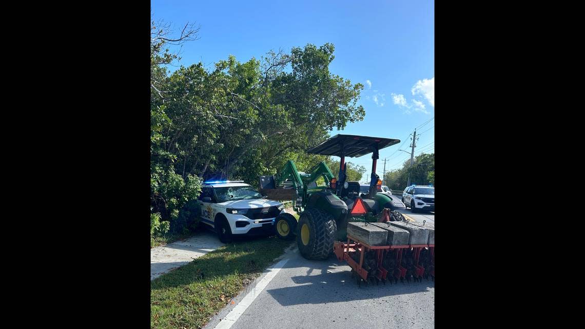 Tractor vs. police cruiser in Key West, Saturday, May 4, 2024.
