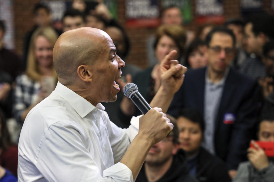 FILE - In this Oct. 28, 2018, file photo, New Jersey Sen. Cory Booker speaks at a get out the vote event hosted by the New Hampshire Young Democrats in Durham, N.H. As Democrats begin to think about the 2020 presidential race, they face a choice between pragmatists who may be able to flip states that President Trump won in 2016 and those such as Booker, Sen. Kamala Harris of California, or Beto O'Rourke of Texas, whose inspirational personal stories may connect with voters on a more emotional level. (AP Photo/Cheryl Senter, File)