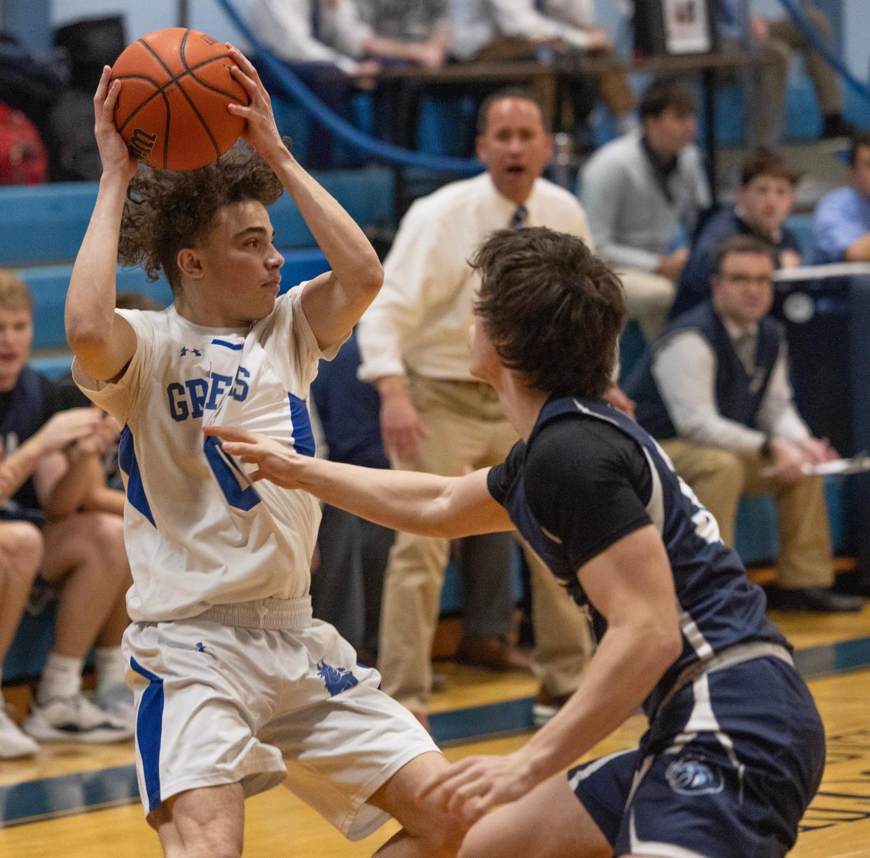 Donovan’s Ryan Jacobs tries to set up a play as he’s closely covered by CBA Peter Noble in first half action. Christian Brothers Academy Basketball defeats Donovan Catholic in Shore Conference Tournament play in Middletown on February 8, 2024.