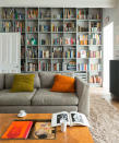 <p> Floor-to-ceiling shelving makes an arresting focal point, particularly on a blank living room accent wall. It can be used to enhance the sense of height in the room and create the illusion of space. Painting cabinetry a bold shade can have a dramatic effect, whilst white or off-black are effective backdrops for display.&#xA0; </p> <p> Create a focal point by ordering items for impact: color-code novels; showcase oversized books and vinyl records front-on to draw the eye; and cluster collections of similar items &#x2013; ceramics, glassware or trinkets &#x2013; for a carefully curated look. </p>