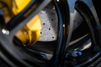 <p>Massive carbon-ceramic brake rotors are new for 2020 and both lighten the car and erase speed better than on previous GT-Rs.</p>