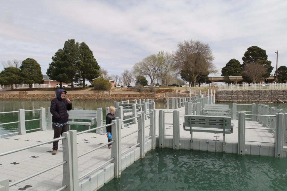 A bridge connects the east and west sides of the Lake Carlsbad beach area, March 17, 2023 along the Pecos River.