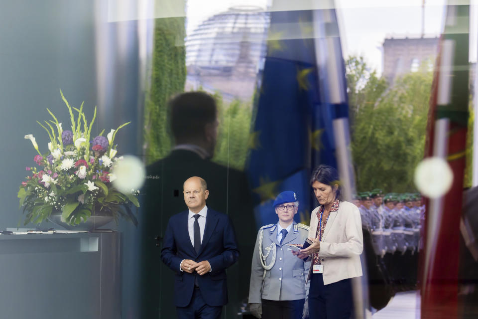 German Chancellor Olaf Scholz, left, waits Portugal's Prime Minister Luis Montenegro before their meeting at the Federal Chancellery in Berlin, Friday, May 24, 2024. (Christoph Soeder/dpa via AP)