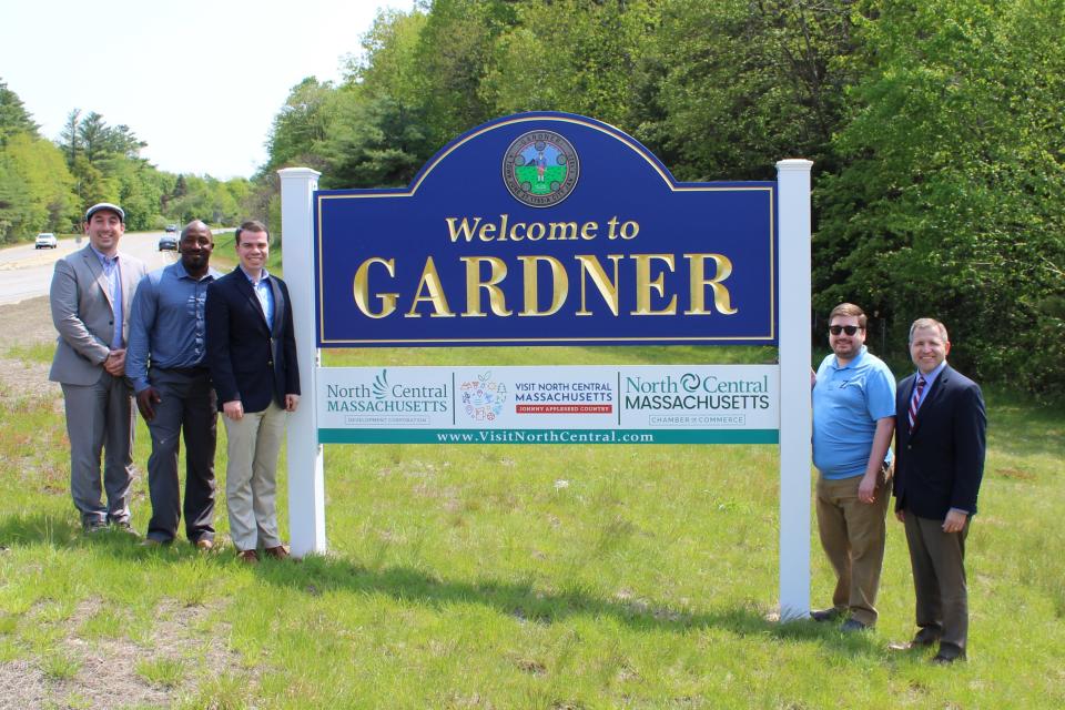The North Central Massachusetts Chamber of Commerce has sponsored a welcome to Gardner sign located on Route 140. Pictured from left are Travis Condon, public affairs manager at the North Central Massachusetts Chamber of Commerce; Dana M. Heath, Ward 2 councilor in Gardner; Gardner Mayor Michael J. Nicholson; Rep. Jonathan D. Zlotnik of Gardner; and Roy Nascimento, president and CEO of the North Central Massachusetts Chamber of Commerce.