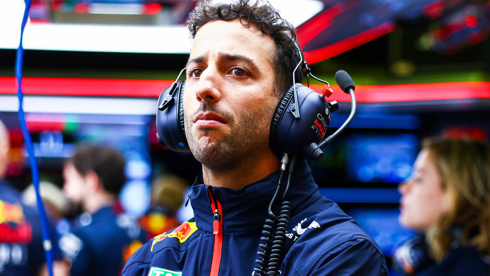 Daniel Ricciardo looks on in the pit for Red Bull.