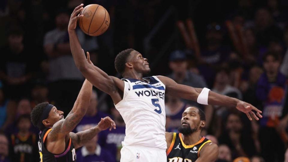  Nthony Edwards #5 of the Minnesota Timberwolves slam dunks the ball ahead of Bradley Beal #3 and Kevin Durant #35 of the Phoenix Suns during the second half of game four of the Western Conference First Round Playoffs at Footprint Center on April 28, 2024 . 