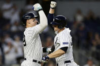 New York Yankees' DJ LeMahieu, right, celebrates his home run with Aaron Judge during the first inning of a baseball game against the Detroit Tigers, Tuesday, Sept. 5, 2023, in New York. (AP Photo/Adam Hunger)