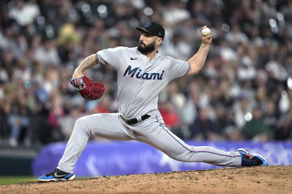 Miami Marlins relief pitcher Tanner Scott delivers during the sixth inning of the team's baseball game against the Chicago White Sox on Friday, June 9, 2023, in Chicago. (AP Photo/Charles Rex Arbogast)