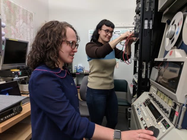 Libby Hopfauf, left, and Ari Lavigne, audiovisual archivists with Moving Image Preservation of Puget Sound, battle the “magnetic media crisis” as they work to digitize movies before they vanish. (GeekWire Photo / Lisa Stiffler) <a href="https://www.geekwire.com/2018/nonprofit-battles-magnetic-media-crisis-digitizing-aging-movies-vanish/" rel="nofollow noopener" target="_blank" data-ylk="slk:Read the story.;elm:context_link;itc:0;sec:content-canvas" class="link "><strong>Read the story.</strong></a>
