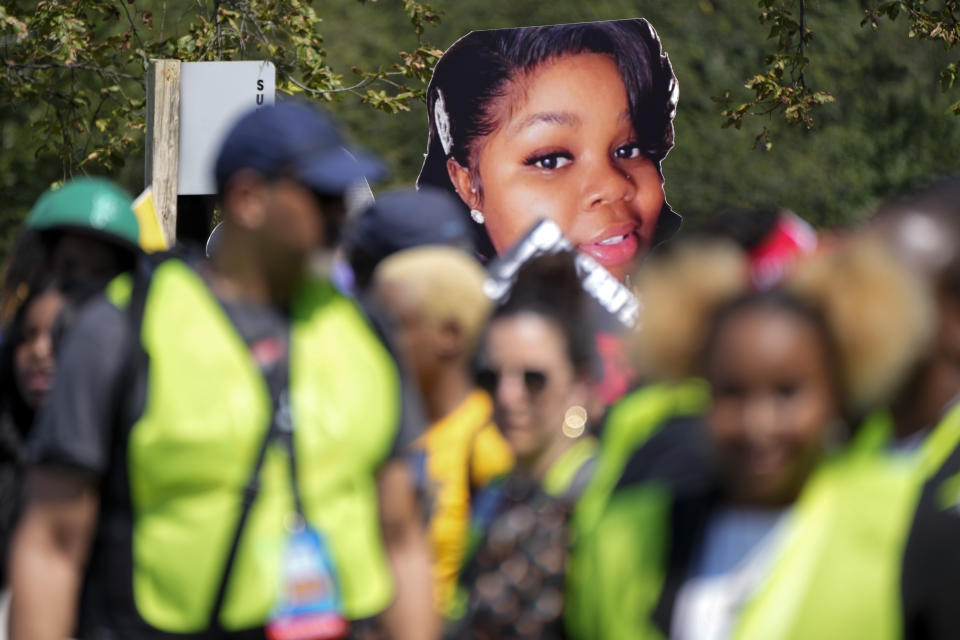 FILE - Demonstrators carry an image of Breonna Taylor, a 26-year-old Black woman who was fatally shot by police in her Louisville, Ky., apartment, as people march to honor the 60th Anniversary of the March on Washington, Saturday, Aug. 26, 2023, in Washington. (AP Photo/Jacquelyn Martin, File)