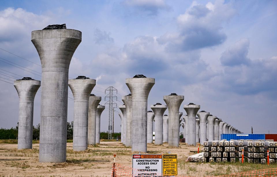 Construction continues Wednesday, March 30, 2022, on pillars for High Speed Rail in Hanford just north of Highway 198.