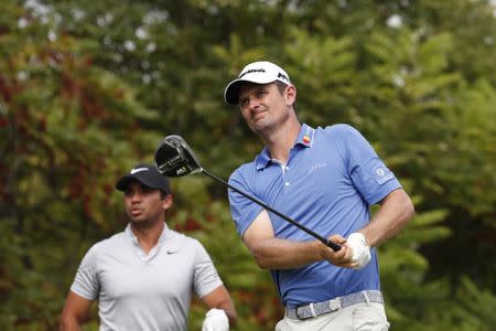 Sep 17, 2017; Lake Forest, IL, USA; Justin Rose tees off on the eighth hole during the final round of the BMW Championship golf tournament at Conway Farms Golf Club. Mandatory Credit: Brian Spurlock-USA TODAY Sports