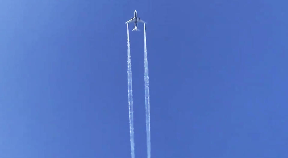 In this photo from video, Delta Air Lines Flight 89 to Shanghai, China dumps fuel over Los Angeles before returning to Los Angeles International Airport for an emergency landing Tuesday, Jan. 14, 2020. Fire officials say fuel apparently dumped by the aircraft returning to LAX fell onto an elementary school playground. A fire department tweet says firefighters are assessing "multiple patients" at the school in the suburban city of Cudahy, Calif. The flight tracking website FlightAware shows that Delta Air Lines Flight 89 to Shanghai, China, departed LAX, circled back over Southern California and returned to the airport. (AP Photo/Matt Hartman)