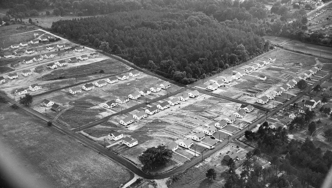 Starter homes pop up in the Capitol Heights neighborhood in 1948 in the post World War ll building boom. The view looks southwest with Glascock Street running diagonally across the right side of the frame and State Street running diagonally across the left side of the frame. News & Observer