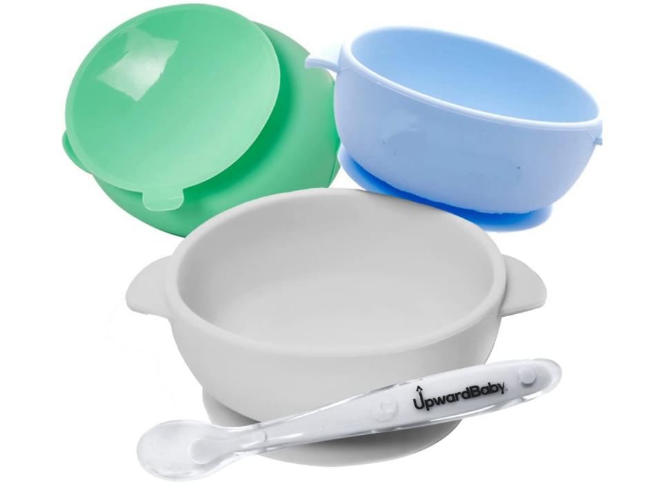 Help your little one learn to eat on their own with this suction bowl set. (Source: Amazon)