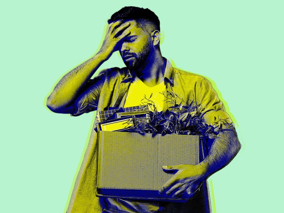 Person holding box laid off on green background 4x3