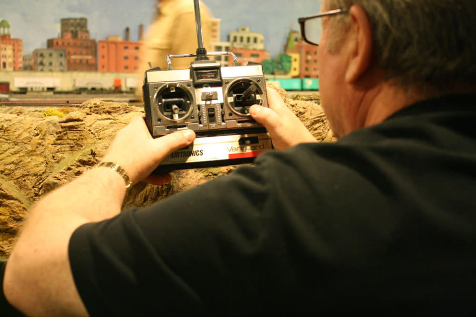 Stuart MacAdam control the trains through one section. After 67 years in the Liberty Village location, The Model Railroad Club of Toronto will be moving to make way for a condo.