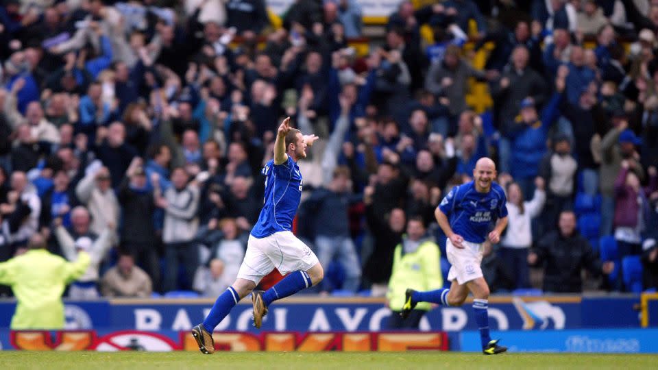 Wayne Rooney celebrates scoring a memorable goal against Arsenal. - Mike Egerton/EMPICS/PA Images/Getty Images