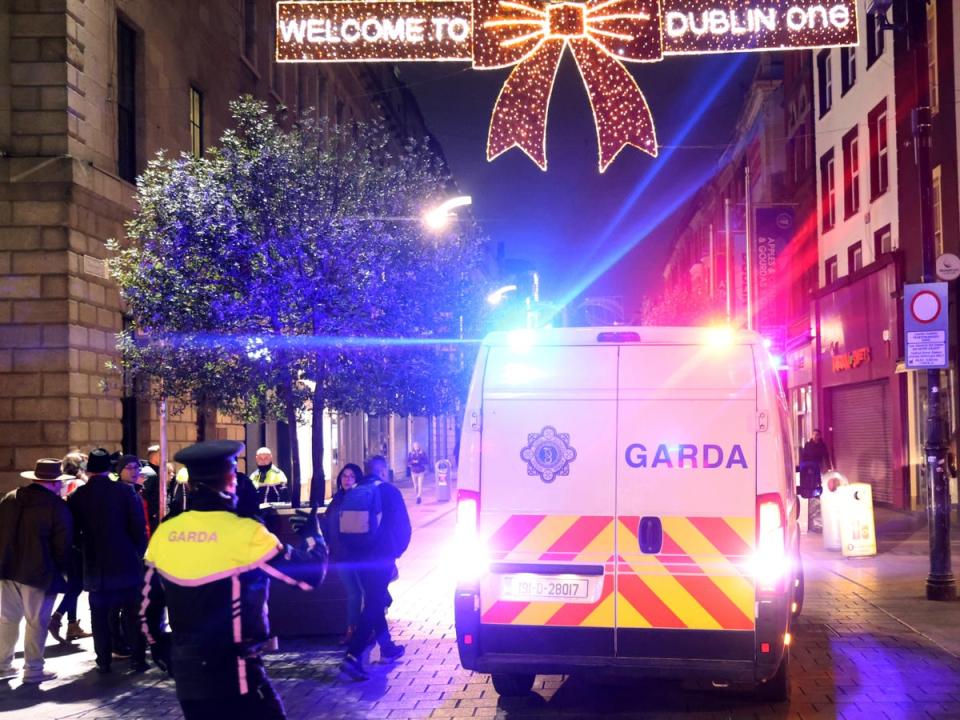 Police patrol central Dublin on Friday (AP)