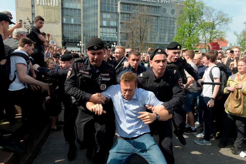 PHOTO: In this May 5, 2018, file photo, Alexei Navalny is detained during an anti-Putin protest rally in Pushkin Square in Moscow. (Gleb Schelkunov/Kommersant via Polaris via Newscom, FILE)