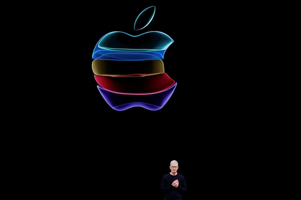 FILE PHOTO: CEO Tim Cook speaks at an Apple event at their headquarters in Cupertino