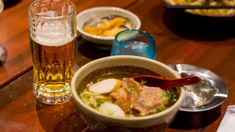 bowl of ramen with beer 