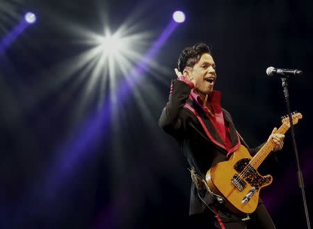 U.S. musician Prince performs on stage at Yas Arena in Yas Island, Abu Dhabi, United Arab Emirates November 14, 2010. REUTERS/Jumana El-Heloueh/File Photo