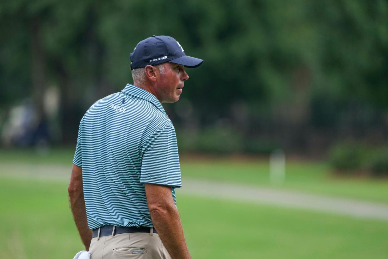 Matt Kuchar traverses the course at at Sedgefield Country Club during the fourth round of the Wyndham Championship.