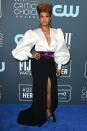 <p>Ryan Michelle Bathe looks chic in this white-and-black look, which she completes with a purple belt.</p>