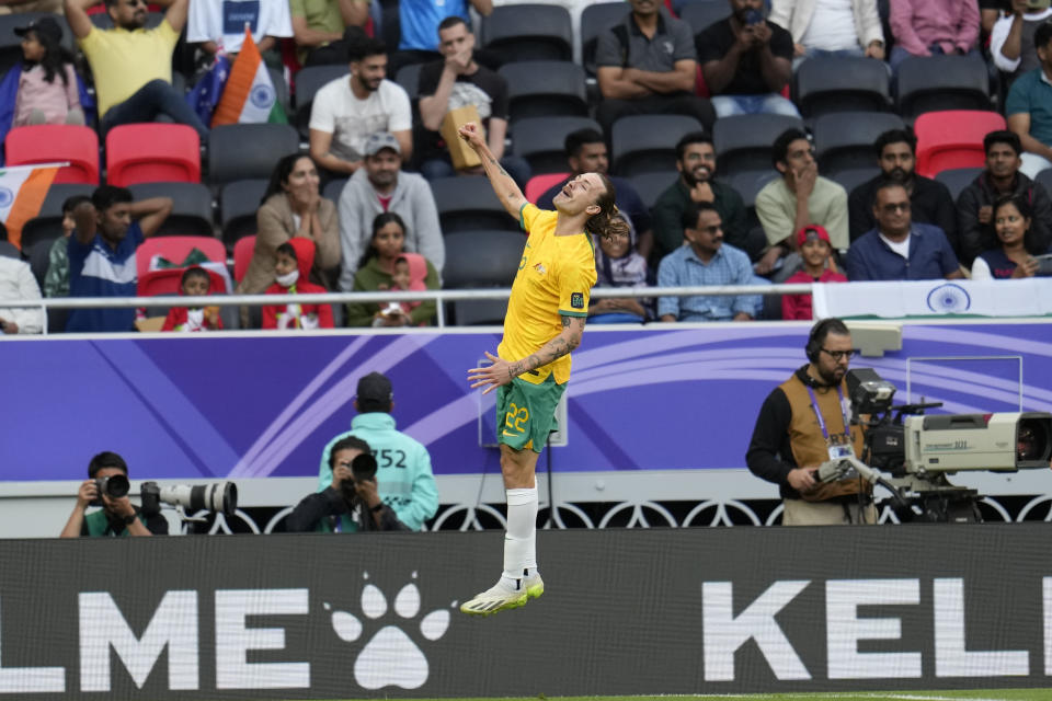 Australia's Jackson Irvine celebrates after scoring the opening goal of his team during the Asian Cup Group B soccer match between Australia and India at Ahmad Bin Ali Stadium in Doha, Qatar, Saturday, Jan. 13, 2024. (AP Photo/Aijaz Rahi)