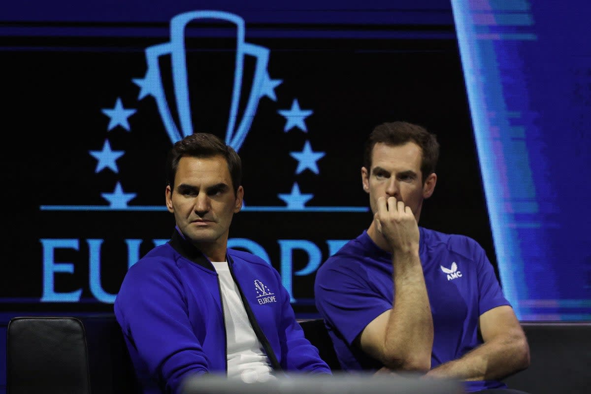 Roger Federer (left) retired from tennis at the 2022 Laver Cup  (AFP via Getty Images)