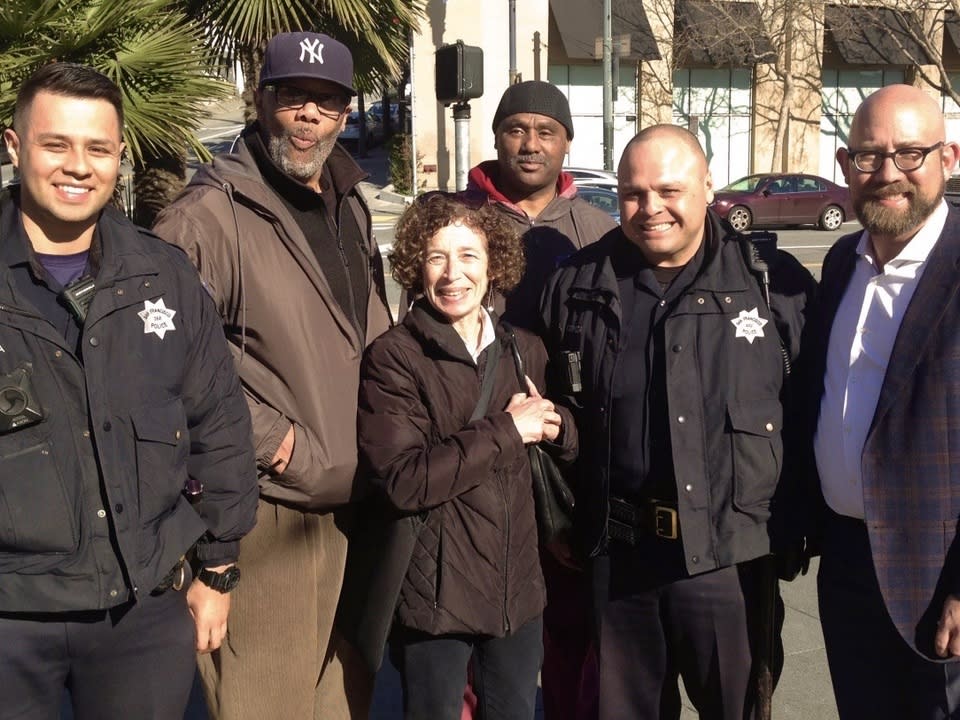 Andrea Aiello (center) and District 8 Supervisor Rafael Mandelman (far right) with CBD staff and SFPD officers.