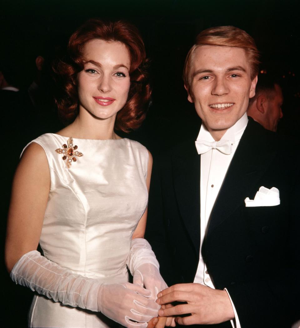 With singer Adam Faith in 1961