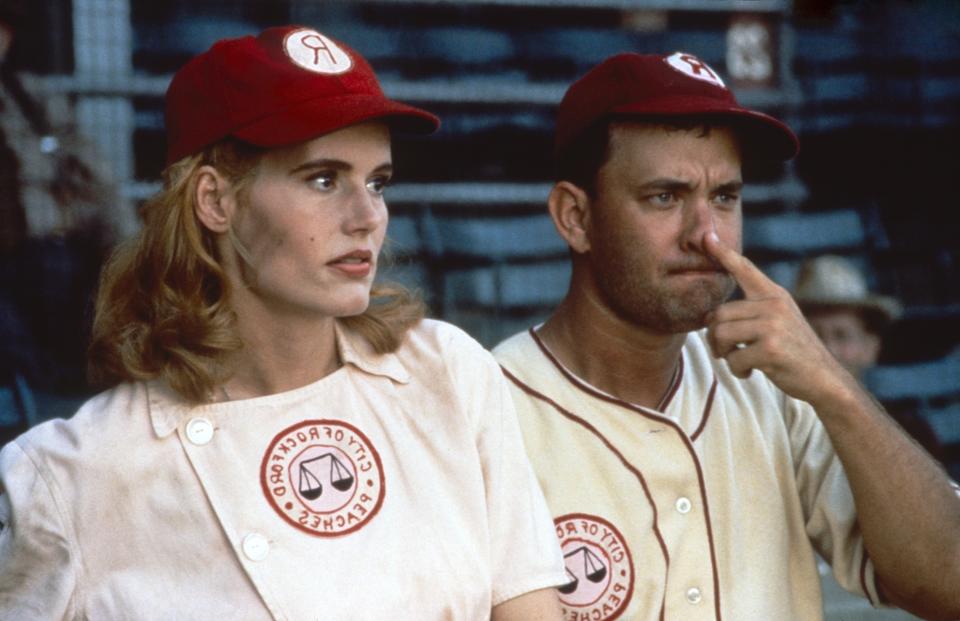 Geena Davis and Tom Hanks in ‘A League of Their Own,’ 1992 - Credit: Everett Collection