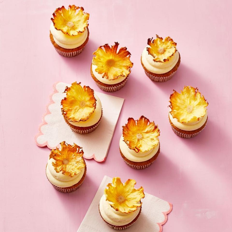 <p>Carrot, ginger and pineapple cupcakes are perfect for the season—top them with gummy googly eyes instead of dried pineapple for extra spook.</p><p>Get the recipe from <a href="https://www.goodhousekeeping.com/food-recipes/a35537898/carrot-pineapple-cupcakes-recipe/" rel="nofollow noopener" target="_blank" data-ylk="slk:Good Housekeeping;elm:context_link;itc:0;sec:content-canvas" class="link ">Good Housekeeping</a>.</p>