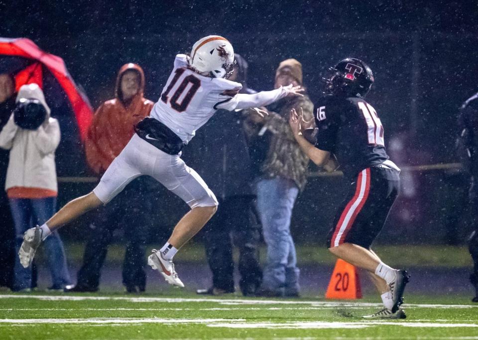 Thurston's Walker Bonar catches a touchdown pass as the No. 8 Colts host No. 9 Dallas in the first round of the OSAA Class 5A state playoffs on Friday, Nov. 3, 2023, at Willamette High School in Eugene.