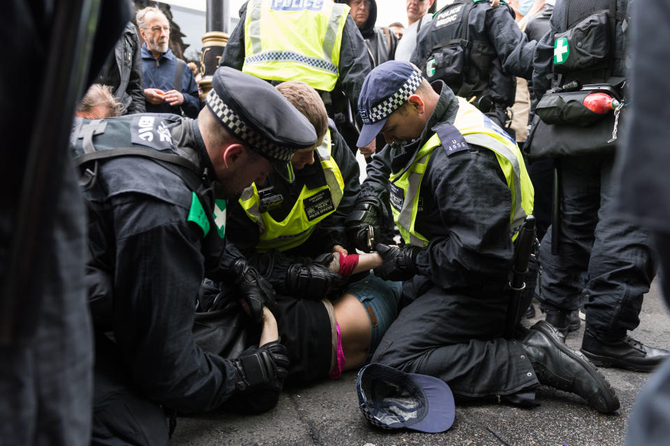 LONDON, UNITED KINGDOM - APRIL 01: Police officers arrest protester during a counter-demonstration to oppose far-right Britain First and the English Defence League (EDL) protests in central London, on April 01, 2017 in London, England. PHOTOGRAPH BY Wiktor Szymanowicz / Barcroft Images London-T:+44 207 033 1031 E:hello@barcroftmedia.com - New York-T:+1 212 796 2458 E:hello@barcroftusa.com - New Delhi-T:+91 11 4053 2429 E:hello@barcroftindia.com www.barcroftimages.com (Photo credit should read Wiktor Szymanowicz / Barcroft Im / Barcroft Media via Getty Images)