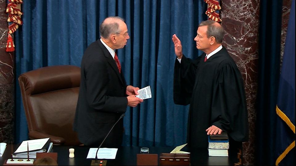 President Pro Tempore of the Senate Sen. Chuck Grassley, R-Iowa., swears in Supreme Court Chief Justice John Roberts as the presiding officer for the impeachment trial of President Donald Trump on Jan. 16, 2020.