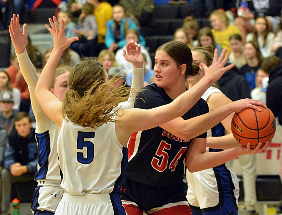 Sisseton's Krista Langager is surrounded by a trio of Florence-Henry defenders including Taylor Watson (5) and Haley Hlavacek (left) during their high school girls basketball game on Thursday, Feb. 15, 2024 in Florence. Sisseton won 62-54.