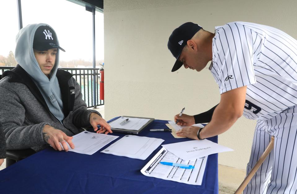 Jesus Rodriguez, a catcher for the Hudson Valley Renegades checks in during Media Day at Heritage Financial Park on April 2, 2024.