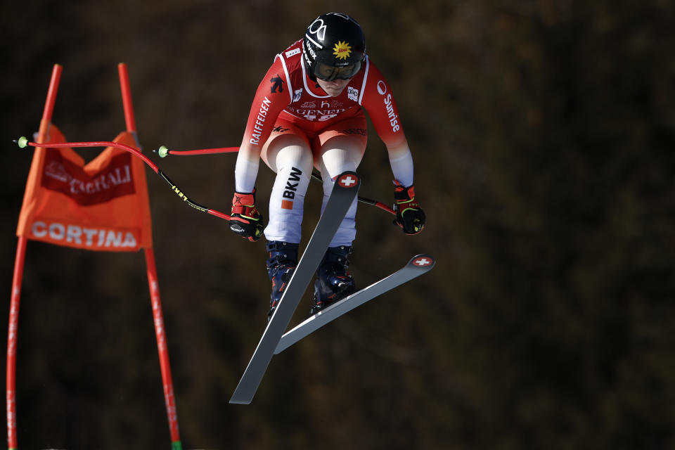 Switzerland's Jasmina Suter competes in an alpine ski, women's World Cup downhill race, in Cortina d'Ampezzo, Italy, Friday, Jan. 26, 2024. (AP Photo/Gabriele Facciotti)