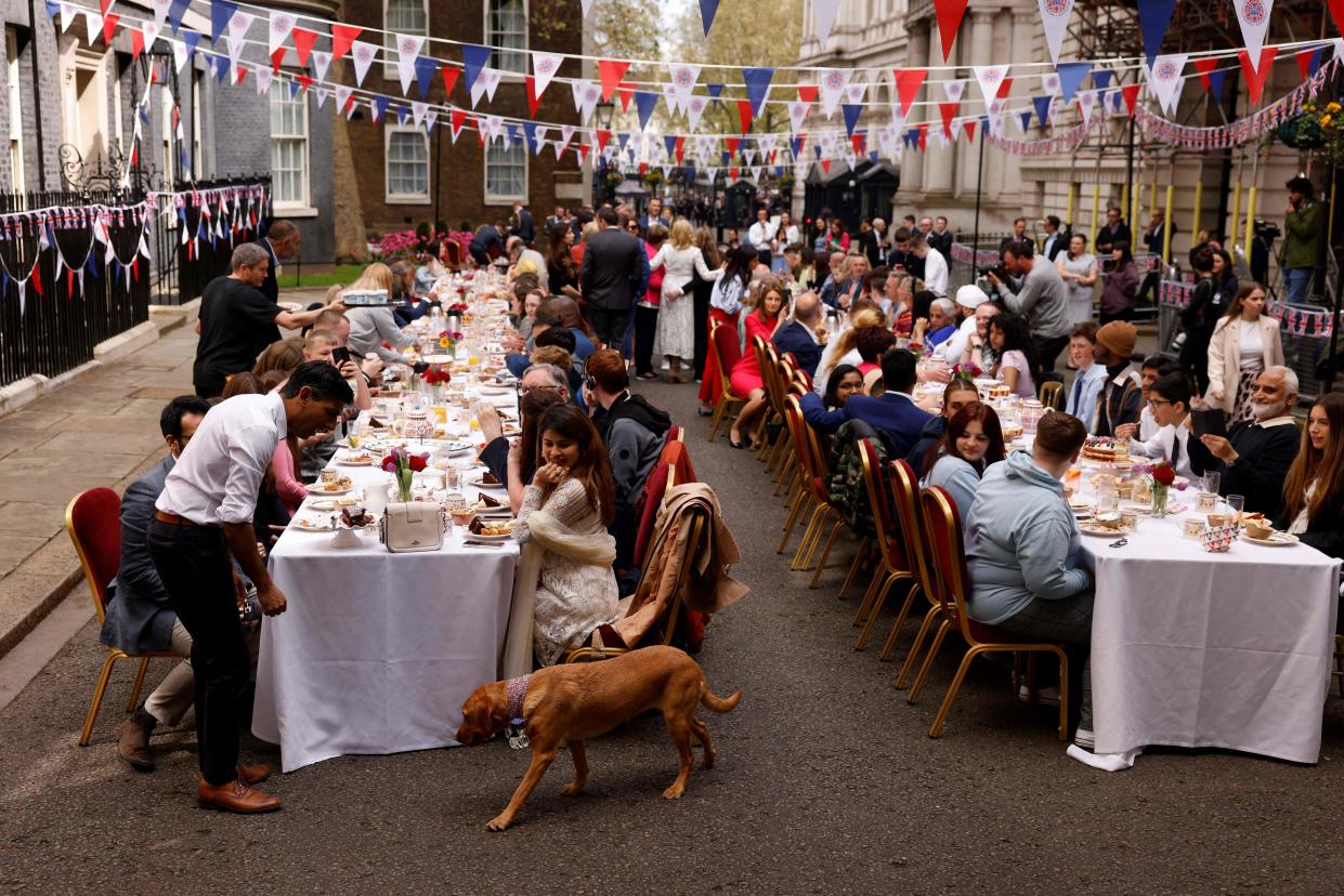 Sunak (left) hosts a street party on Downing Street (AFP/Getty)